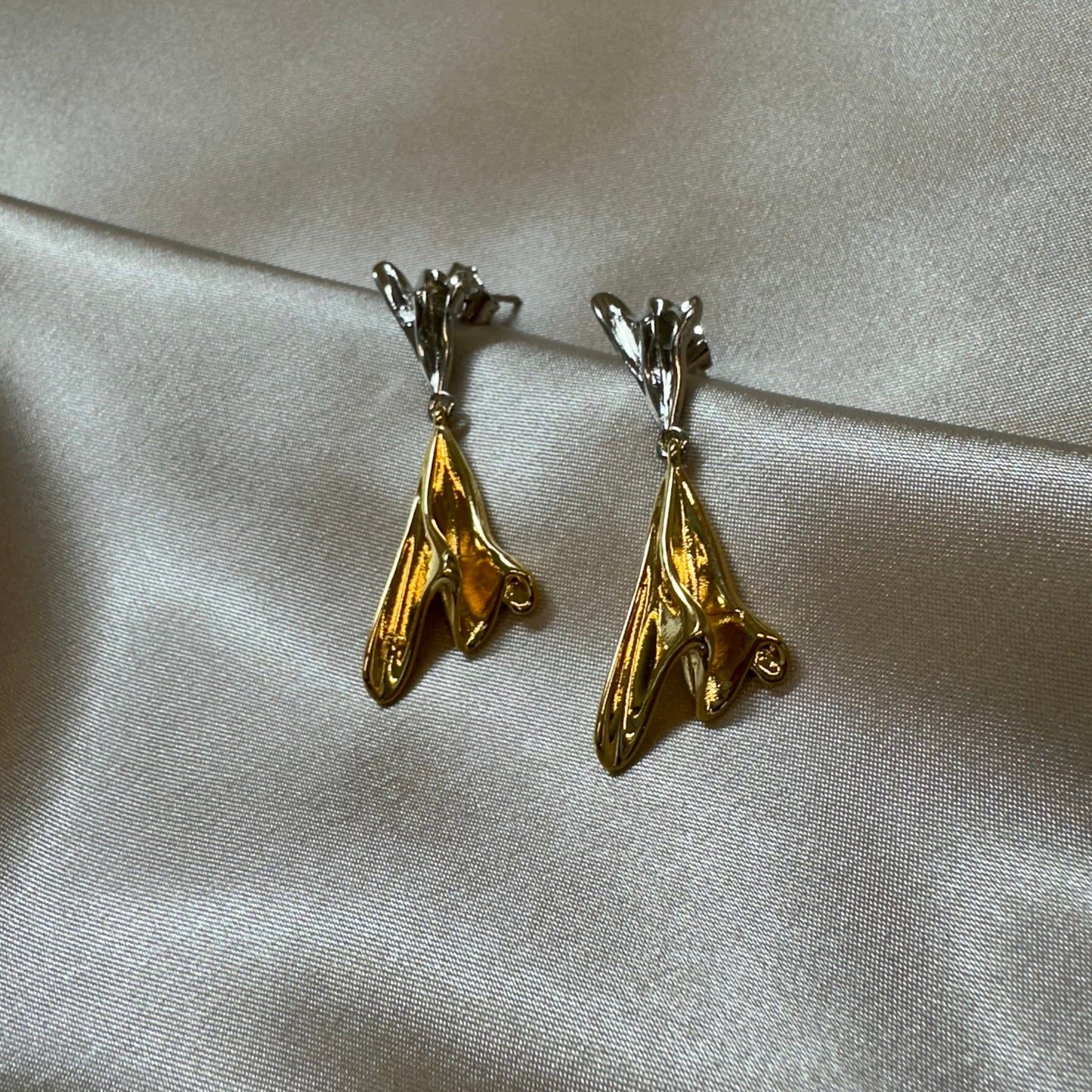 Aretes Bustamante